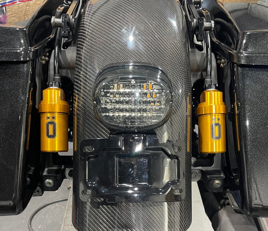 OHLINS STX relocation brackets